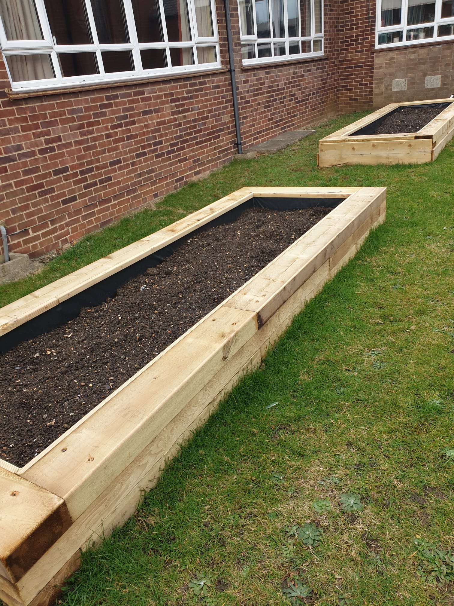 Photo of Community Garden Project including raised beds