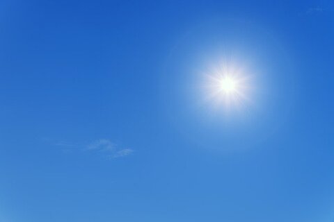 Image of the sun and blue sky