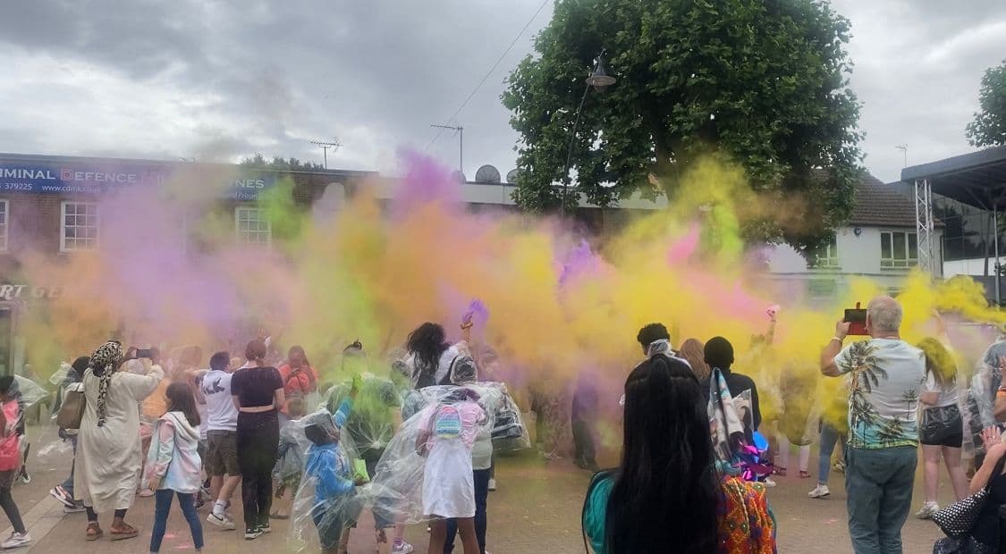 Photo of crowd during festival of colour throw in Queensway