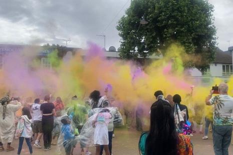 Photo of crowd during festival of colour throw in Queensway