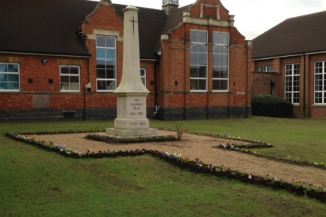Image of War Memorial planted with flowers