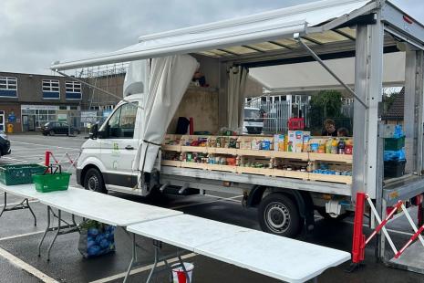 Photo of MK Food Bank Mobile Shop Van with table