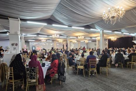 Iftar guests seated opening their fast
